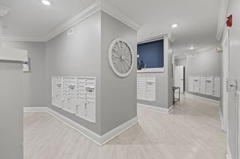 a large clock on a wall in a room with filing cabinets at Central Island Square, South Carolina